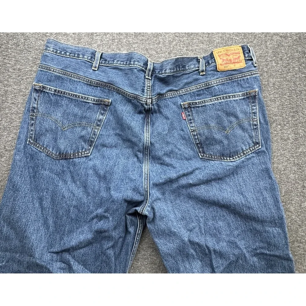 Levis 550 Relaxed Fit Mens Blue Jeans‎ Mens Size 50x32 Fits 50x31 Denim *Hole*
